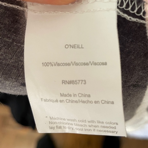 O’Neill, wrap dress, high-low, flutter bottom hem, size medium. - Picture 4 of 5